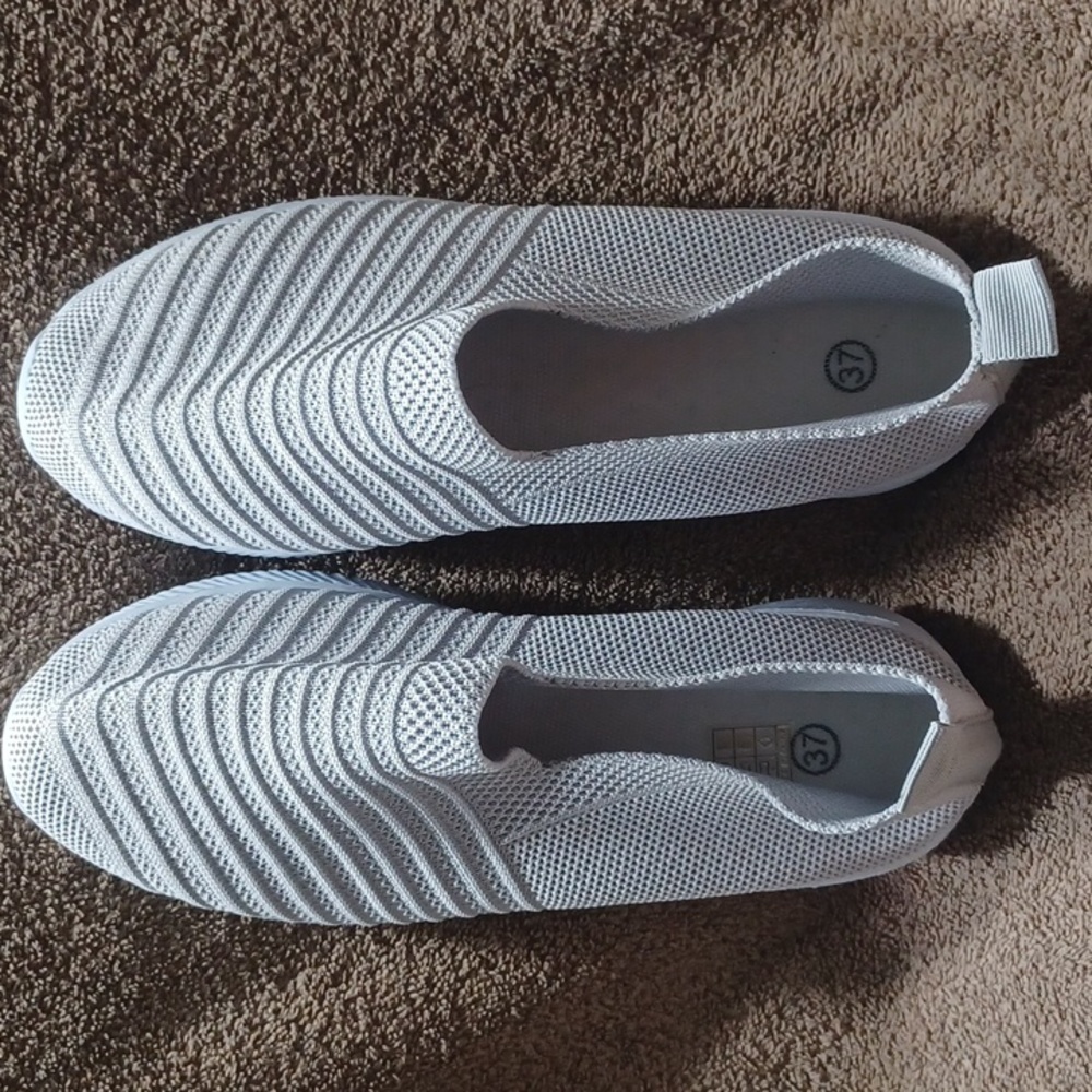 Womens size 37 slip on shoes. Made in China.